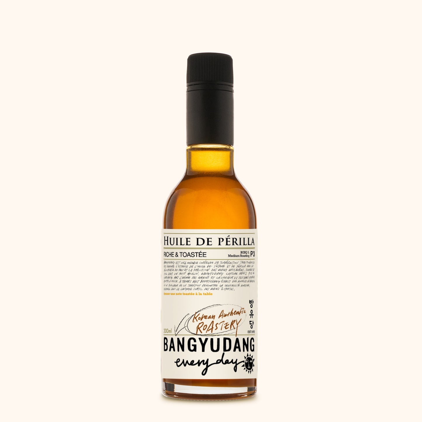 Bouteille de 200ml d'huile de périlla torréfiée Bangyudang P3, fond clair, étiquette beige à motif floral et typographie noire.