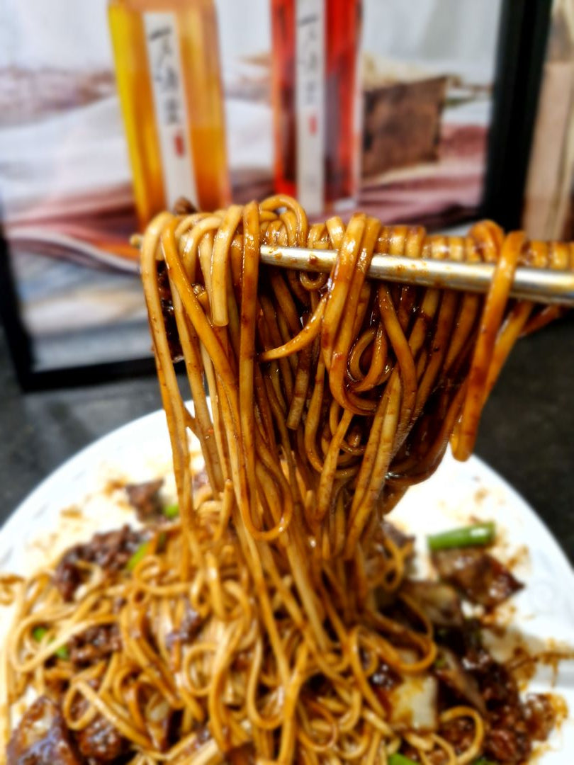 Photo du plat Jjajangmyeon cuisiné avec les produits du kit