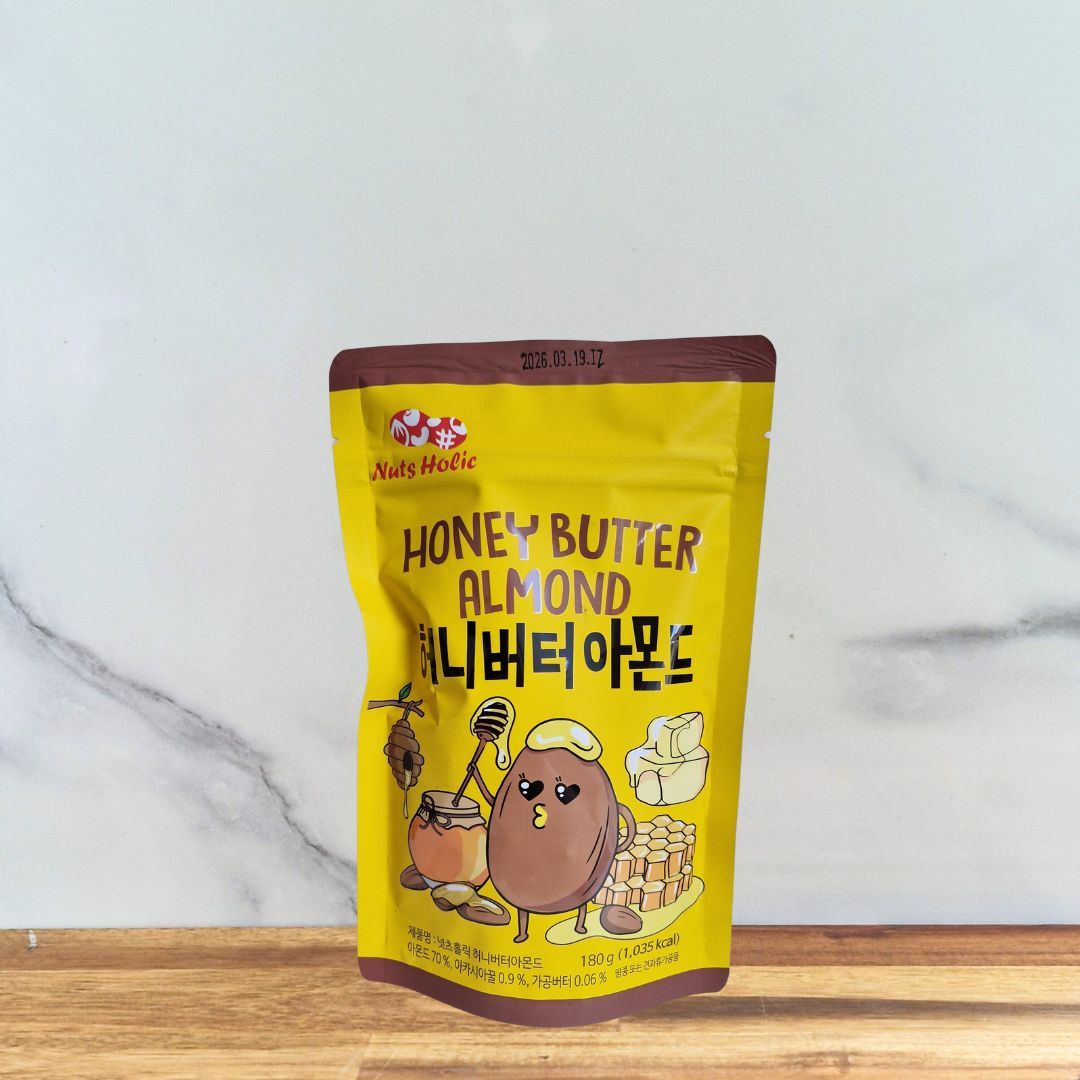 sachet jaune d'Amandes Miel Beurre de la marque Nutsholic en 180g