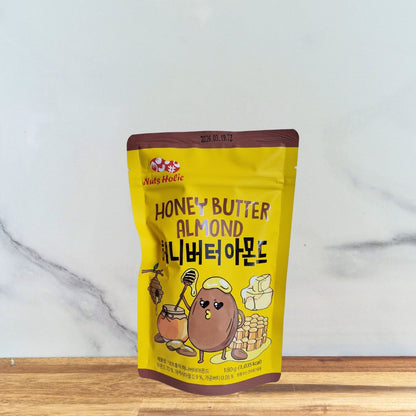 sachet jaune d'Amandes Miel Beurre de la marque Nutsholic en 180g