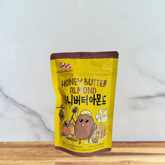 sachet jaune d'Amandes Miel Beurre de la marque Nutsholic en 180g