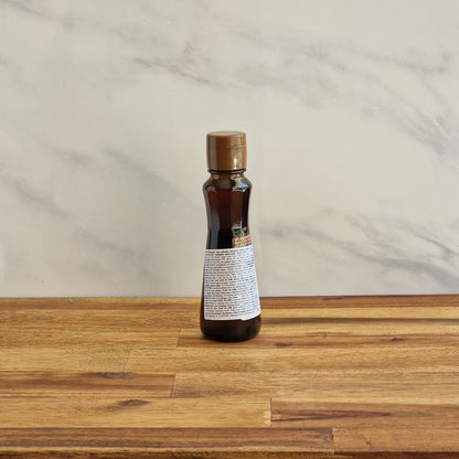 Bouteille d'huile de sésame grillé Ofood, petit format de 160ml, vu de dos