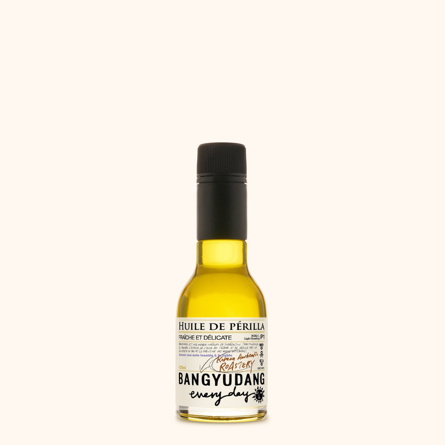 Bouteille de 100ml d'huile de périlla légère Bangyudang P1, fond clair, étiquette jaune pâle et typographie noire.