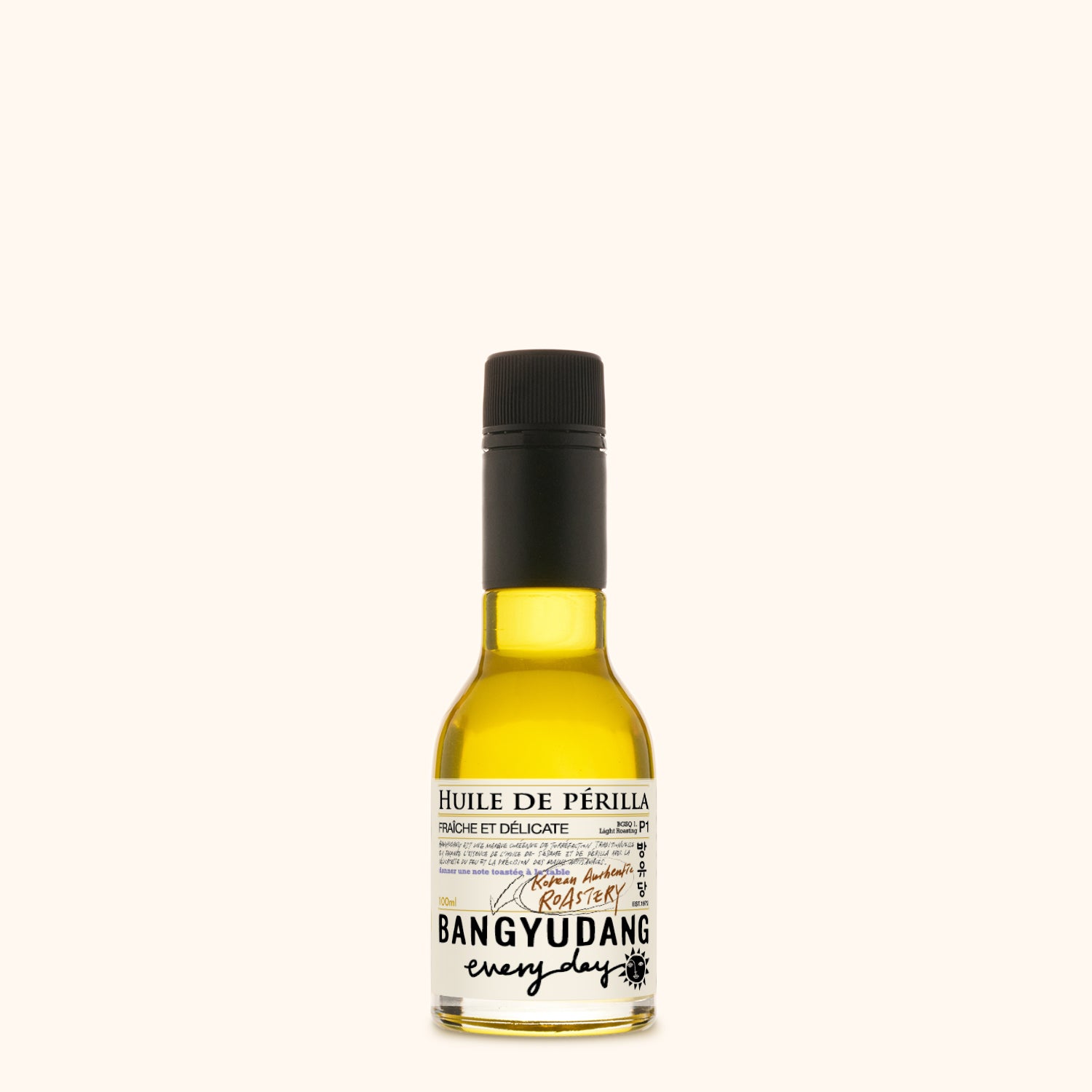 Bouteille de 100ml d'huile de périlla légère Bangyudang P1, fond clair, étiquette jaune pâle et typographie noire.