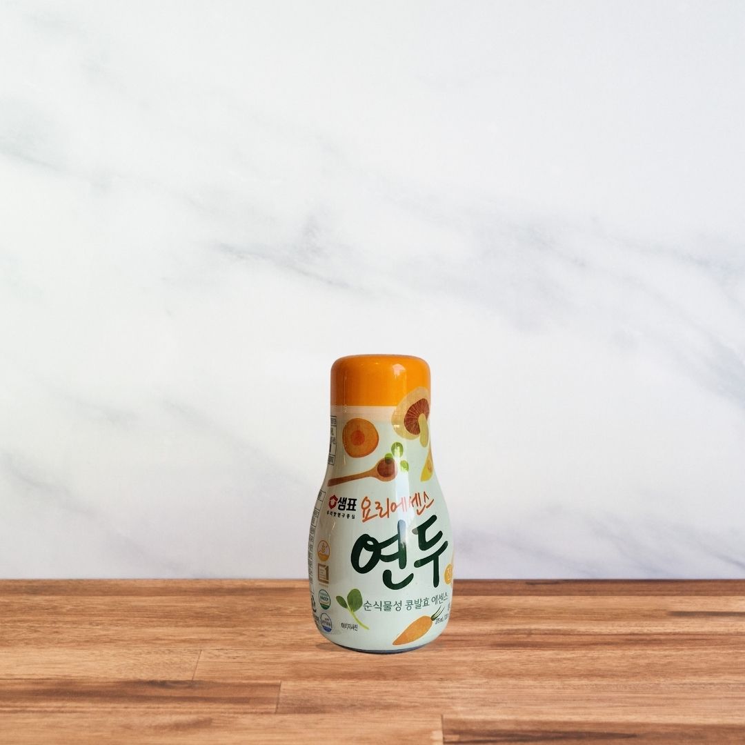 Bouteille de sauce Yondu 275 ml Sempio, étiquette végétale aux tons verts et orange avec illustrations de légumes.