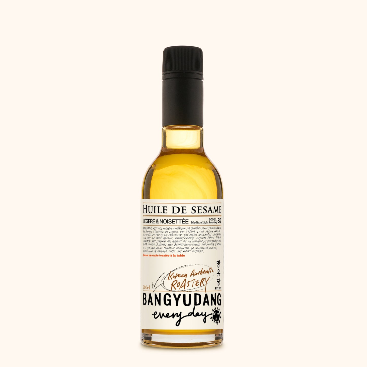 Bouteille de 200ml d'huile de sésame douce Bangyudang S2, fond clair, étiquette beige dorée et typographie noire.